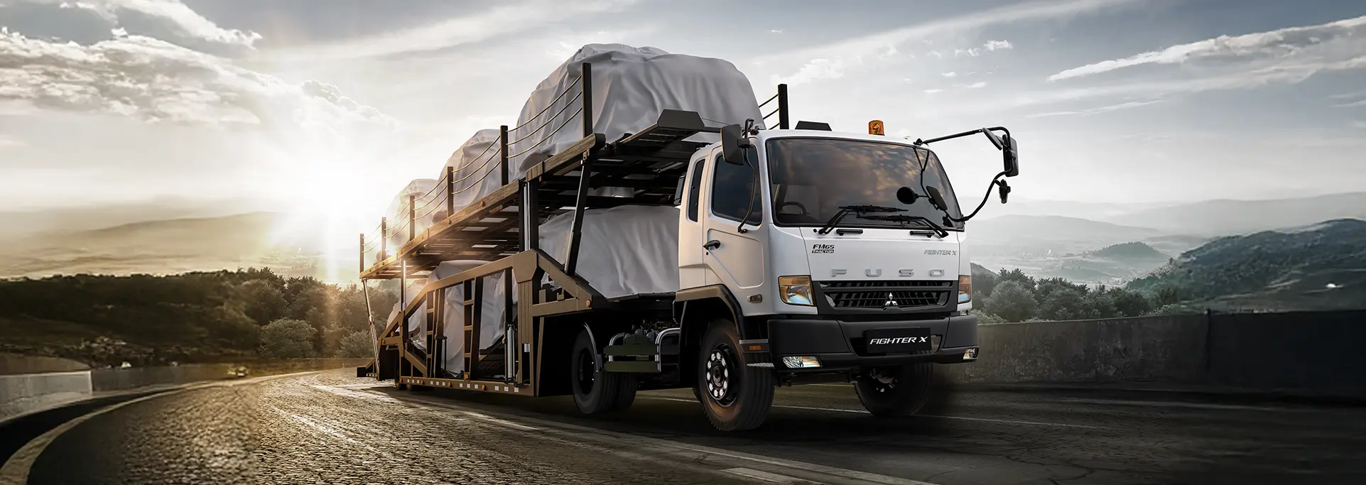 Mitsubishi Fuso FM65F Tractor Head dalam aplikasi long-haul resmi KTB